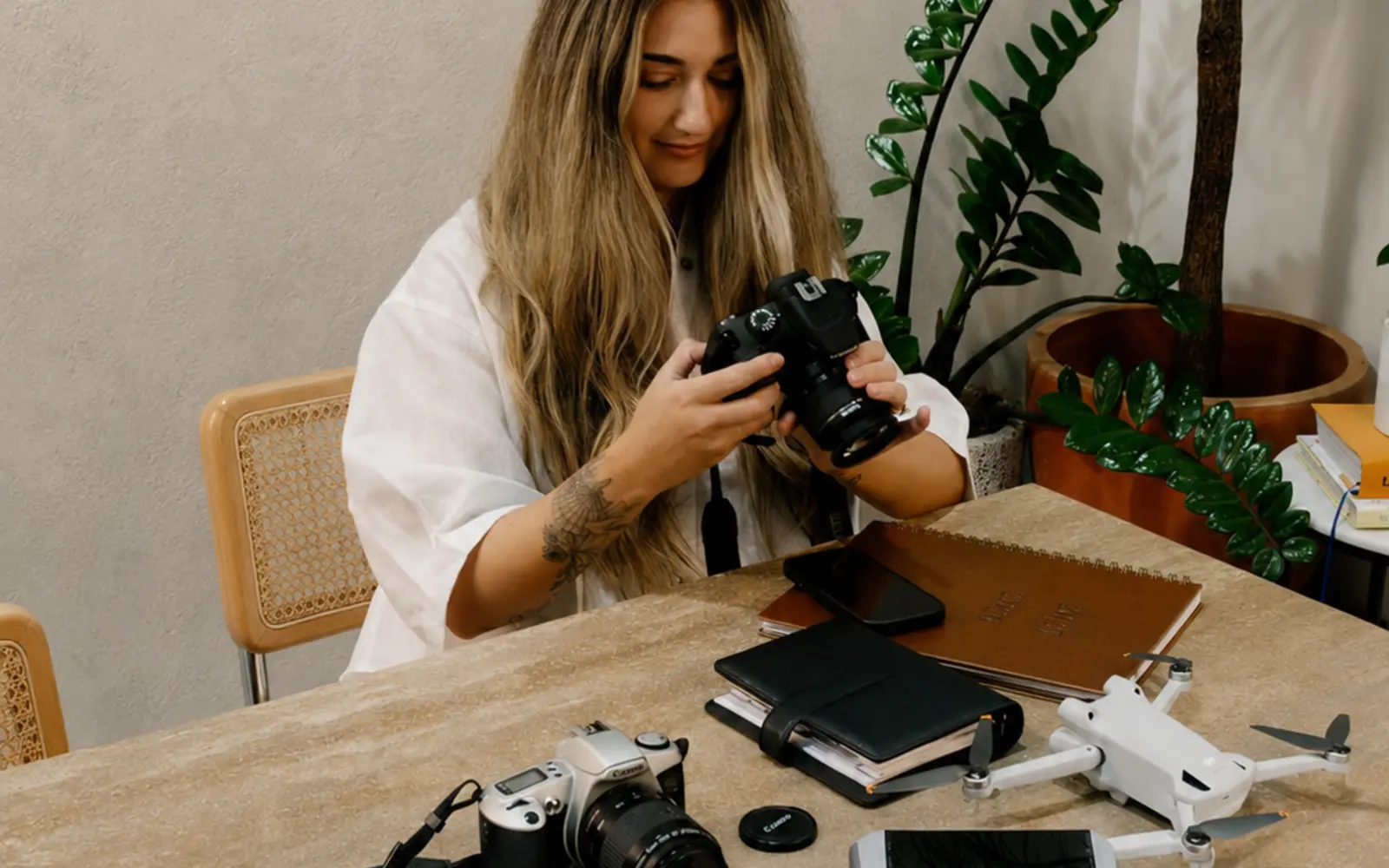 Creator preparing photography equipment at Birdcage Studios Mackay