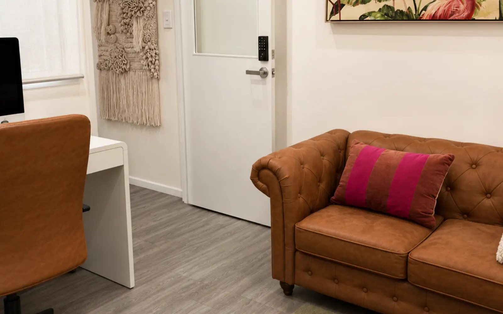 Desk, lockable door and lounge in the Birdcage Hot Office